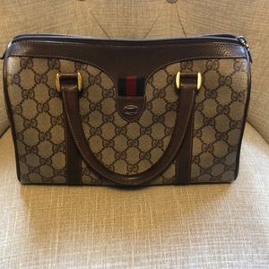 Gucci doctor bag.